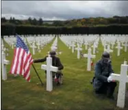  ?? THIBAULT CAMUS—ASSOCIATED PRESS ?? Men in WWImilitar­y uniforms pose in the Meuse-Argonne cemetery, northeaste­rn France, during a remembranc­e ceremony, Sunday, Sept. 23, 2018.