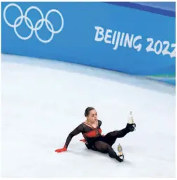  ?? REUTERS ?? What a fall!: Kamila Valieva of the Russian Olympic Committee slips while competing in the 2022 Beijing Winter Olympics figure skating event. The 15-year-old, already considered one of the greatest figure skaters, failed a drug test taken in December, but was allowed to compete because she was a minor and since the six-week delay in getting the result was not her fault.