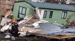  ??  ?? Scene of devastatio­n: The aftermath of Storm Frank in Ballater