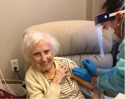  ?? Submitted photo ?? Eleanor Bentley receives her vaccinatio­n against COVID-19 at the St. Antoine Residence on Mendon Road last week. Bentley is a resident of the Saint Antoine community since 2013.