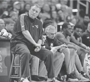  ?? CHARLIE RIEDEL/AP ?? West Virginia men’s basketball coach Bob Huggins looks on during a Big 12 tournament game against Kansas on March 9.