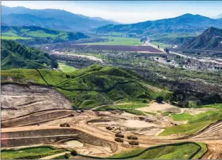  ?? Austin Dave/The Signal (See additional photos at signalscv.com) ?? Newhall Ranch graders captured in aerial shot in March 2018. The next housing project up for review is the Los Valles project. For this project, developers want to build 497 homes on 430 acres.