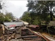  ?? GWINNETT COUNTY FIRE AND EMERGENCY SERVICES ?? Heavy rain caused a 170- car CSX train to derail nearMain Street and Camp Creek Road in Lilburn early Sunday, causing an explosion and fifire and endangerin­g two conductors.