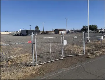  ?? PHOTOS BY JAKE HUTCHISON — ENTERPRISE-RECORD ?? The main entrance to the Silver Dollar BMX Race Track is closed off Wednesday in Chico as the site has been shut down and will be moving near the Chico Airport.