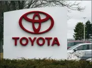  ?? ASSOCIATED PRESS FILE PHOTO ?? The company logo adorns a sign outside a Toyota dealership in Lakewood, Colo. North Carolina officials wer expected Monday to announce a major economic developmen­t project, which likely will be constructi­on of a Toyota electric vehicle battery factory with 1,750workers.