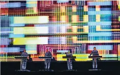  ??  ?? Back to the future: Ralf Hütter (far left) and the rest of Kraftwerk on stage in body suits