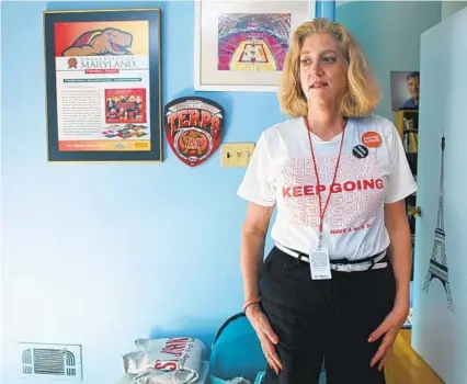  ?? KARL MERTON FERRON/BALTIMORE SUN ?? Andrea Chamblee, wife of slain Capital Gazette sports journalist John McNamara, stands outside his home office Wednesday.