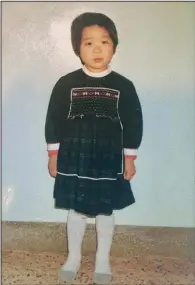  ?? (AP/Joo-Rei Mathieson) ?? This undated photo shows Joo-Rei Mathieson as a child in South Korea. A Brothers Home intake document describes Mathieson as a lost street kid brought in by police. It notes that she’s “capable
of labor.”