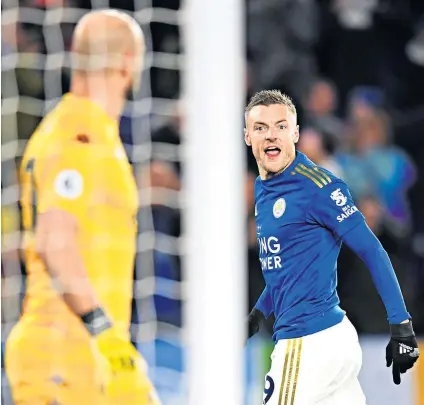  ??  ?? Rubbing it in: Jamie Vardy goads Pepe Reina after dispatchin­g his penalty past the Aston Villa goalkeeper to make it 2-0