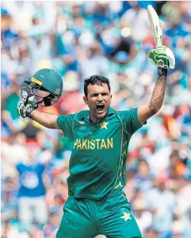  ??  ?? Pakistan’s Fakhar Zaman celebrates reaching his century last Sunday.