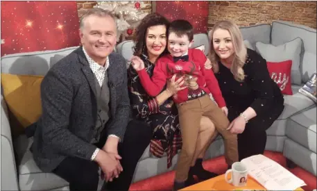  ??  ?? Tralee’s Christoper Lynch, or ‘Cheeky Chris’ as he is now known, pictured here with his mother, Lisa, with TV presenters Daithí and Maura on the Today Show on Monday.