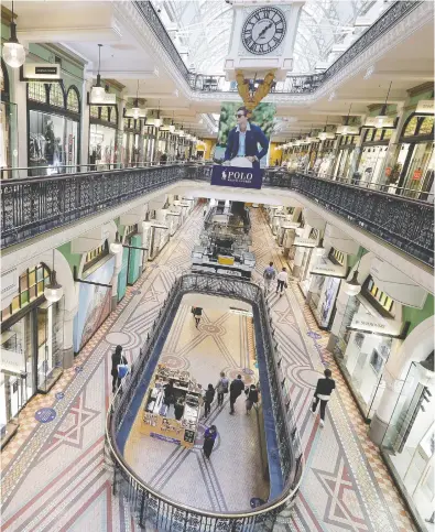  ?? RICK RYCROFT / THE ASSOCIATED PRESS ?? A sparsely attended shopping centre in Sydney, Australia is shown earlier this month. A survey by Ipsos has
concluded that two-thirds of people are still nervous about leaving their homes.