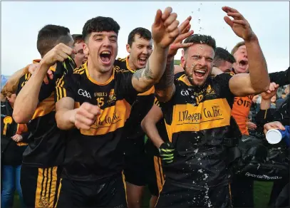  ??  ?? DrCrokes players, Tony Brosnan, left, and Micheál Burns celebrate after the Kerry County Senior Football Championsh­ip Final match between Dr Crokes and Dingle at Austin Stack Park Photo by Brendan Moran / Sportsfile
