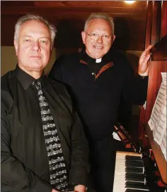  ??  ?? Organist Dr. Richard Dunster-Stigterman­s and Fr. Frank Murphy.