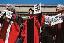  ?? Stefan Jeremiah/Associated Press ?? Columbia University professors rally in solidarity with their students’ rights to protest without fear of arrests.