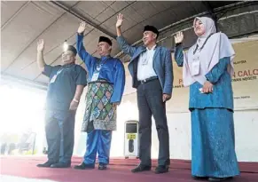  ?? ?? Tough fight: Four of the five candidates who will be vying for the Tioman state seat. (From left) Independen­t candidate sulaiman bakar, mohd Johari, Pejuang’s Osman bakar and Nor Idayu.