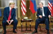  ?? DOUG MILLS/THE NEW YORK TIMES ?? President Donald Trump meets with Russian President Vladimir Putin in Helsinki on July 16. New U.S. sanctions have weakened the ruble.