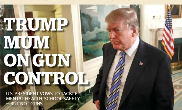  ?? AP ?? President Donald Trump pauses as he arrives to speak about the mass shooting at the South Florida High School from the White House. —