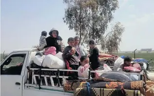  ?? PICTURE: EPA ?? Syrians who fled from Al-Raqqa city due to the fighting there arrive at Ain-Issa camp 55km away. The number of people fleeing Syria’s civil war to Turkey, Lebanon, Jordan, Iraq and Egypt has passed the 5 million mark, data from the UN refugee agency...