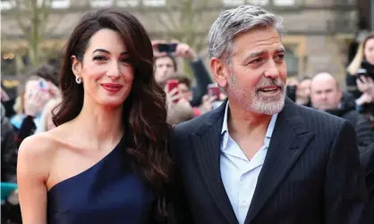  ?? Photograph: Andrew Milligan/PA ?? George and Amal Clooney, representi­ng the Clooney Foundation for Justice, arriving at a charity gala at the McEwan Hall in Edinburgh.