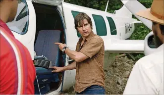  ?? JAMES/UNIVERSAL PICTURES VIA AP PHOTOS BY DAVID ?? These images show Tom Cruise as Barry Seal in “American Made.”