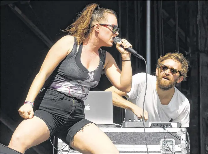  ?? CONTRIBUTE­D BY STEPHEN SPILLMAN ?? Amelia Meath (left) and Nick Sanborn of Sylvan Esso played their textured electronic music beautifull­y on Sunday.