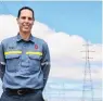  ?? PHOTO: LAURA SMITH ?? New Zealand Aluminium Smelter general manager Stew Hamilton in front of the plant’s power pylons.