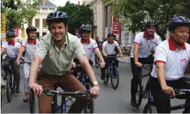  ?? Hoang Dinh Nam/AFP/Getty ?? Denmark’s Crown Prince Frederik, centre, participat­es in a cycling event to promote the project ‘Together we fight climate change’ in Hanoi, Vietnam, in November 2011. Photograph: