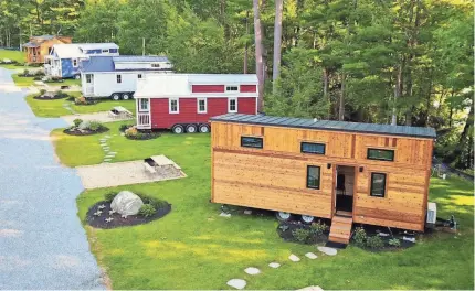  ?? JEROME BRAGA/PETITE RETREATS ?? Less than an hour north of Boston, Tuxbury Pond in South Hampton, N.H., offers five tiny homes, including one that welcomes pets. If you like the homes, the company also sells them.