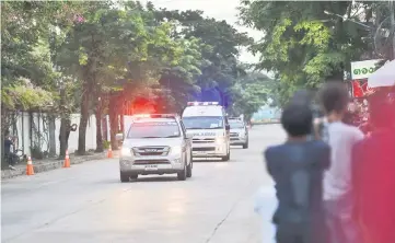  ?? — AFP photo ?? An ambulance, transporti­ng alleged members of the children’s football team, approaches the hospital in the northern Thai city of Chiang Rai.