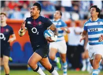  ??  ?? Debut try: Solomona runs in to beat Argentina