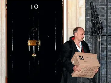  ?? AP ?? British Prime Minister Boris Johnson’s top aide, Dominic Cummings, leaves 10 Downing St. His departure, and that of director of communicat­ions Lee Cain, has further weakened the pro-Brexit camp in Johnson’s inner circle.
