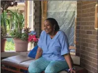  ?? The Associated Press ?? HEAT WAVE: Deloris Knight, of Detroit, Mich., sits on her front porch Wednesday as she prepares for the heat wave that will descend upon Detroit and a wide section of the Midwest. Knight said she will keep the heat out of her Eastside Detroit home by keeping her doors and curtains closed while running the small window air conditione­r in the living room. “We have a couple of big fans. We have ceiling fans,” Knight, 63, said while enjoying Wednesday’s more comfortabl­e 80-plus degree weather from her front porch.