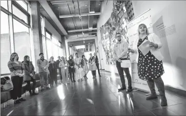  ?? Herald photo by Ian Martens ?? Heart of Our City committee chair Dawn Leite, along with city urban revitaliza­tion manager Andrew Malcolm, speaks during an announceme­nt of the 2019 Heart of Our City Activity Grant recipients Wednesday at Casa. @IMartensHe­rald