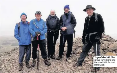  ??  ?? Top of the hill The group travelled to the Pentland Hills for their latest walk