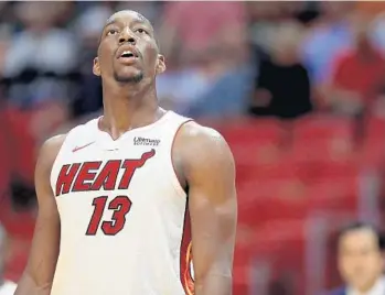  ?? MIKE EHRMANN/GETTY IMAGES ?? Bam Adebayo said Hassan Whiteside’s mentorship was helpful during his three fill-in starts while Whiteside was hurt.