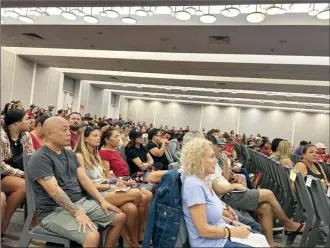  ?? The Maui News / MELISSA TANJI photos ?? Hundreds packed the Honoapiila­ni Ballroom at The Westin Maui Resort and Spa Wednesday for a council committee meeting on a proposed recovery and resiliency plan in response to the Aug. 8 fires.