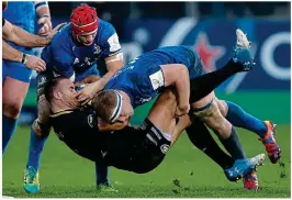  ??  ?? HARD YARDS: James Ryan (right) leaves Bath defenders in his wake during a stellar display featuring some big carries at the Recreation Ground, a performanc­e which earned him the Man of the Match award; (left) Dan Leavy lays a heavy hit on Jamie Roberts