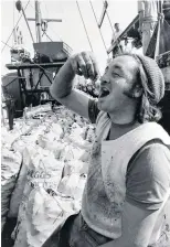  ??  ?? Shucks . . . Terry Osborne, of Bluff, samples the delicacy as the first boat unloaded at the port at the start of the 1977 season. The price back then — 96c a dozen.