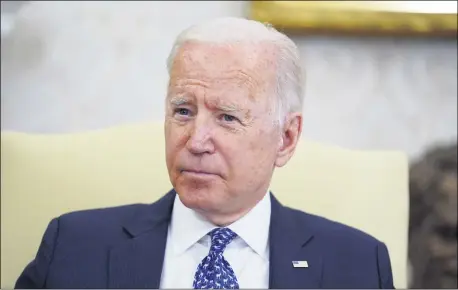  ?? EVAN VUCCI — THE ASSOCIATED PRESS ?? President Joe Biden listens as he meets with Ukrainian President Volodymyr Zelenskyy in the Oval Office of the White House Sept. 1.