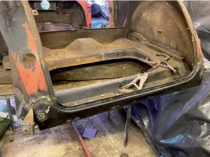  ??  ?? The replacemen­t boot surround welded into place – note the fillets covering up the bumper mounts in the panel which are not needed for an early car such as this one.