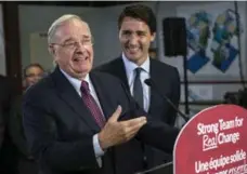  ?? PAUL CHIASSON/THE CANADIAN PRESS FILE PHOTO ?? Paul Martin’s government, defeated in 2006, and Justin Trudeau’s have federal spending priorities in common.