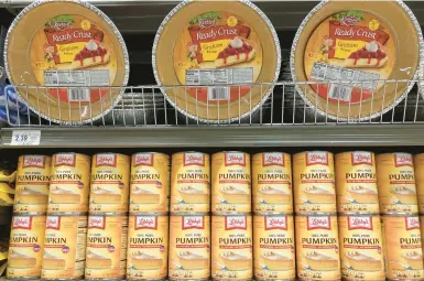  ?? MARTA LAVANDIER/AP 2021 ?? Canned pumpkin is one of the Thanksgivi­ng holiday staples that has seen double-digit price increases this year.