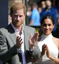  ?? Martin Meissner/Associated Press ?? Britain’s Prince Harry and Meghan, Duchess of Sussex, attend a town hall meeting in Duesseldor­f, Germany, in September 2022. Harry is fifth in line for the British crown.