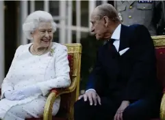  ?? (PA) ?? Guests of honour at a garden party organised by the British ambassador in Paris, 2014