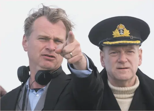  ?? Melinda Sue Gordon ?? Writer-director Christophe­r Nolan (left) and actor Kenneth Branagh discuss a scene on the set of “Dunkirk.”