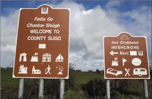  ??  ?? The spelling of Enniscrone on council signs above (right) is about to change.