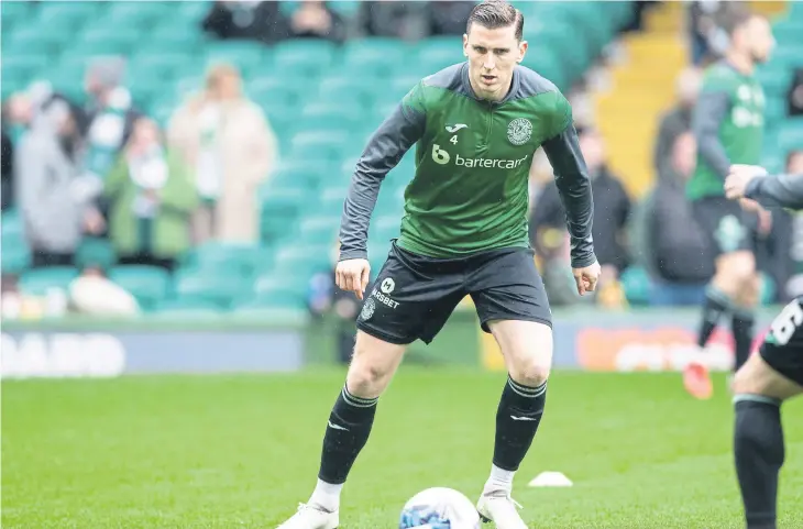  ?? ?? Hibs’ Paul Hanlon was on the wrong end of a disputed handball penalty decision that levelled up Saturday’s match with Celtic, before the champions triumphed 3-1