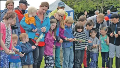  ??  ?? There were plenty of youngsters to enjoy the mega game of pass the parcel.