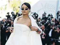  ?? THIBAULT CAMUS / AP ?? La estrella. La cantante Rihanna creó gran revuelo ayer